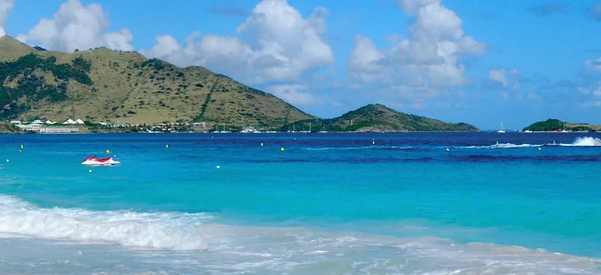 Синт-Мартен (Нидерланды): Panorama of Orient Beach in Saint Martin; Saint Martin banner
